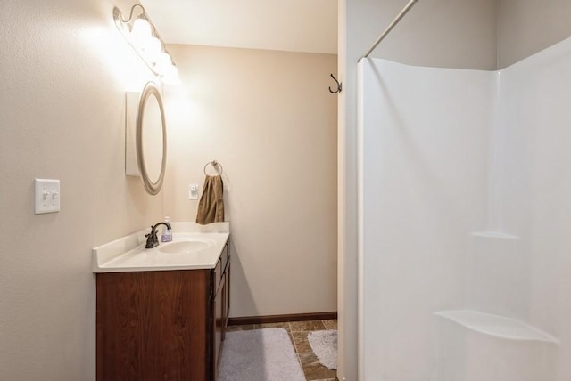 5616 Dostal Dr SW, Cedar Rapids, IA 52404 - bathroom with vanity and a shower