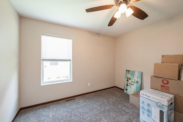5616 Dostal Dr SW, Cedar Rapids, IA 52404 - carpeted empty room with ceiling fan and baseboards