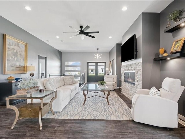 5112 Scenic View Ct SW, Cedar Rapids, IA 52404 - living area featuring ceiling fan, a stone fireplace, wood finished floors, and recessed lighting