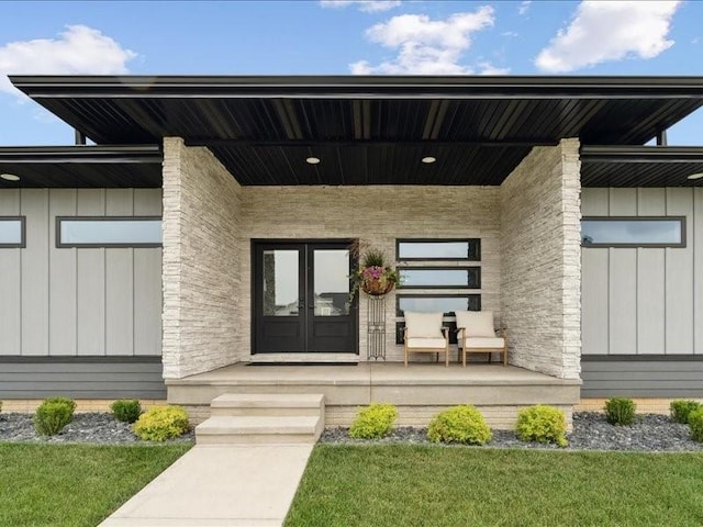 5112 Scenic View Ct SW, Cedar Rapids, IA 52404 - entrance to property with board and batten siding and french doors
