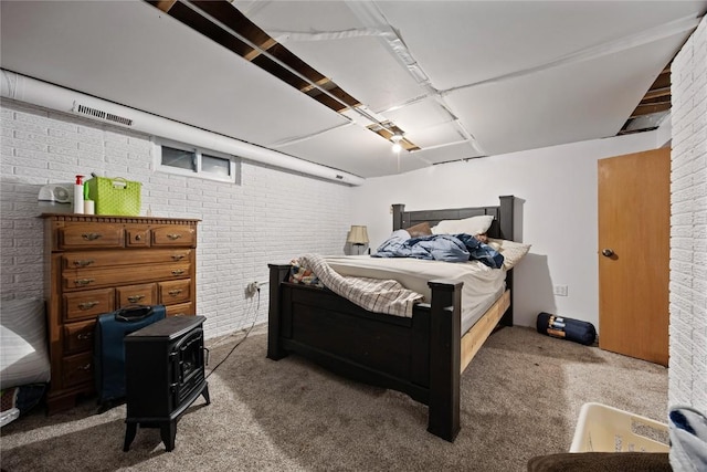 200 Drexel Dr SW, Cedar Rapids, IA 52404 - bedroom with brick wall and carpet flooring