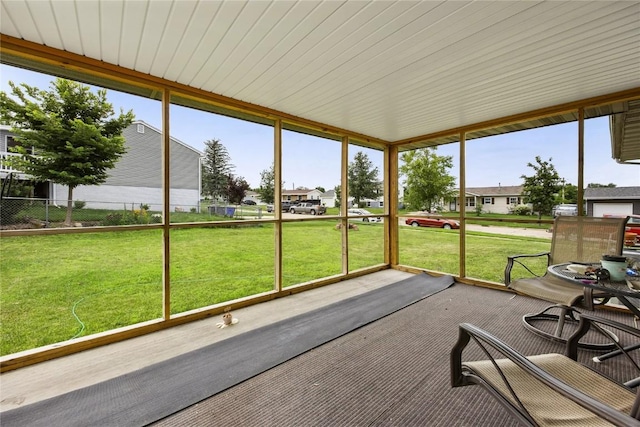 200 Drexel Dr SW, Cedar Rapids, IA 52404 - unfurnished sunroom featuring a residential view
