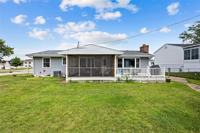200 Drexel Dr SW, Cedar Rapids, IA 52404 - back of house with a sunroom and roof with shingles