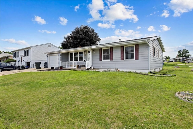 200 Drexel Dr SW, Cedar Rapids, IA 52404 - view of front of home featuring an attached garage, a porch, a front yard, and concrete driveway