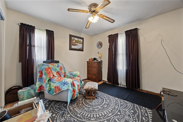 200 Drexel Dr SW, Cedar Rapids, IA 52404 - bedroom featuring a ceiling fan and baseboards
