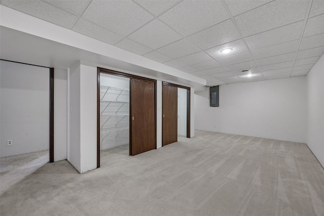 805 W 17th St, Vinton, IA 52349 - finished basement featuring light carpet, a drop ceiling, electric panel, and recessed lighting