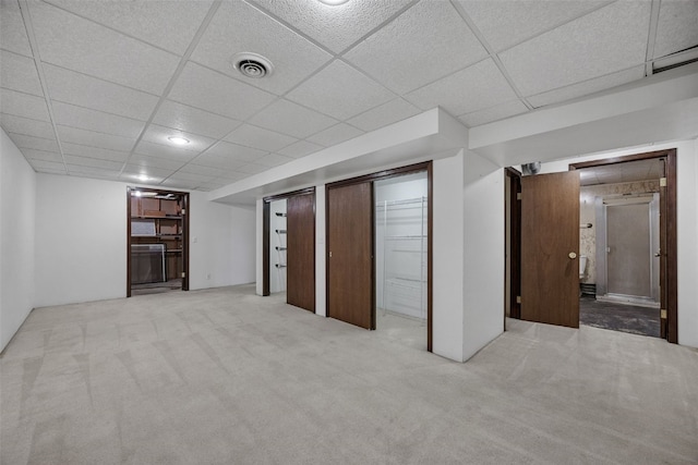 805 W 17th St, Vinton, IA 52349 - finished basement with carpet flooring and a paneled ceiling