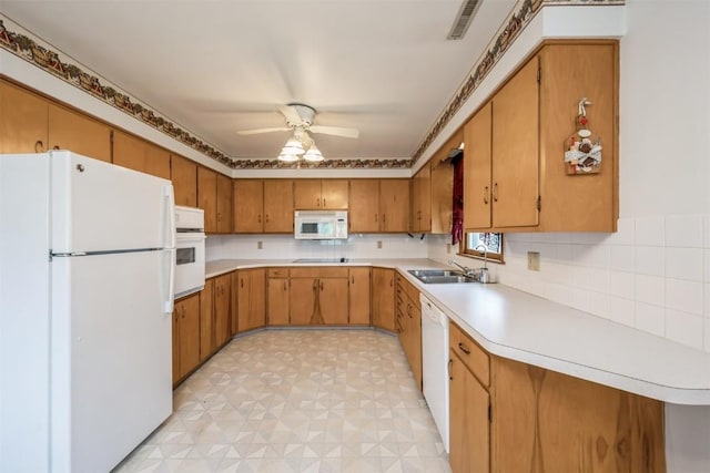 819 Valley St, Center Point, IA 52213 - kitchen with white appliances, light countertops, ceiling fan, and light floors