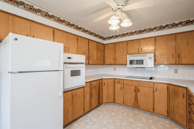 819 Valley St, Center Point, IA 52213 - kitchen featuring white appliances, ceiling fan, decorative backsplash, light countertops, and light floors