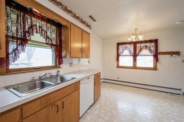 819 Valley St, Center Point, IA 52213 - kitchen with a baseboard heating unit, white dishwasher, a chandelier, light countertops, and light flooring