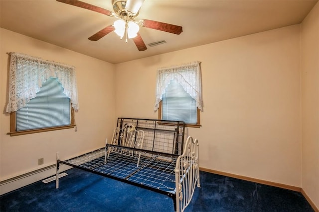 819 Valley St, Center Point, IA 52213 - bedroom featuring carpet floors and a ceiling fan
