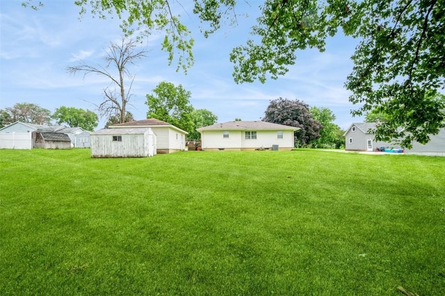 819 Valley St, Center Point, IA 52213 - view of yard featuring a storage unit
