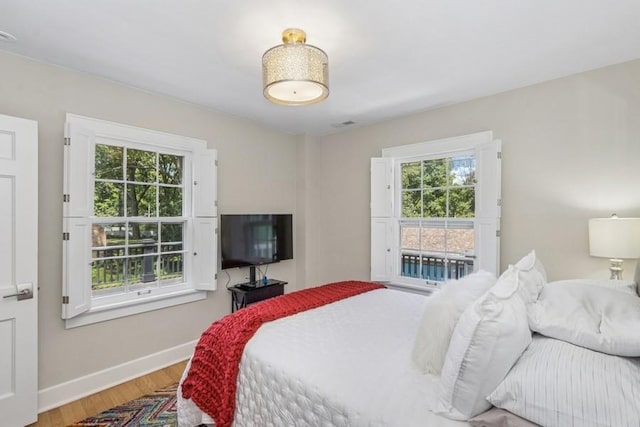 318 Ferson Ave, Iowa City, IA 52246 - bedroom with wood finished floors and access to outside