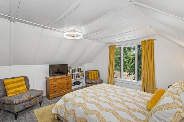 318 Ferson Ave, Iowa City, IA 52246 - bedroom featuring vaulted ceiling, a decorative wall, and carpet flooring