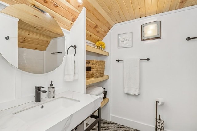 318 Ferson Ave, Iowa City, IA 52246 - bathroom featuring wood ceiling, vanity, and vaulted ceiling