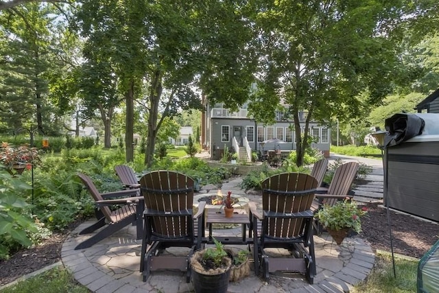 318 Ferson Ave, Iowa City, IA 52246 - view of patio featuring an outdoor fire pit
