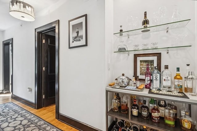 318 Ferson Ave, Iowa City, IA 52246 - indoor dry bar featuring wood finished floors
