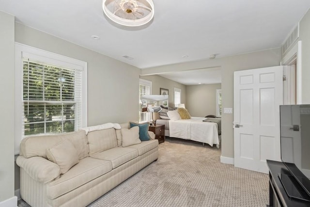 318 Ferson Ave, Iowa City, IA 52246 - bedroom featuring light carpet and baseboards