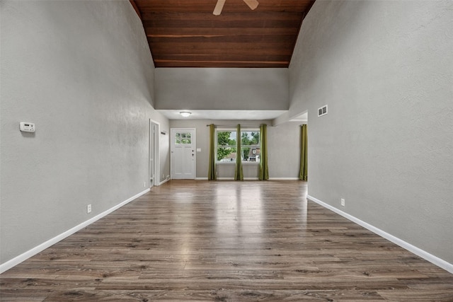 2539 Vernon Ct SE, Cedar Rapids, IA 52403 - unfurnished living room with dark wood finished floors, a ceiling fan, high vaulted ceiling, and wooden ceiling