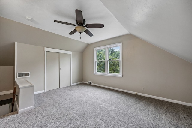 2539 Vernon Ct SE, Cedar Rapids, IA 52403 - bonus room with carpet, vaulted ceiling, and a ceiling fan