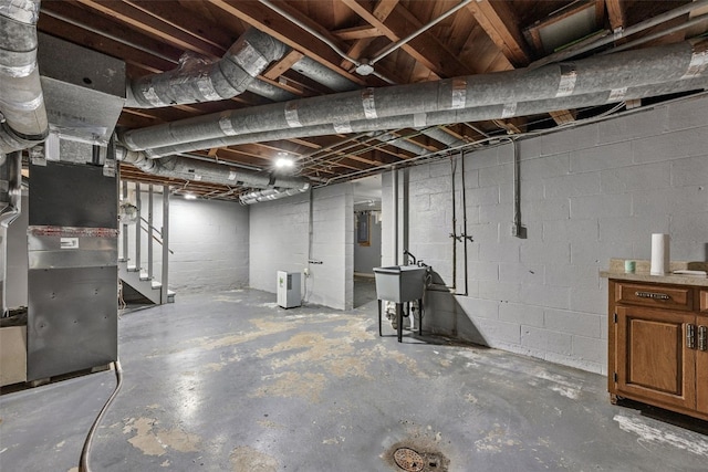 2539 Vernon Ct SE, Cedar Rapids, IA 52403 - unfinished below grade area featuring stairs, heating unit, and electric panel