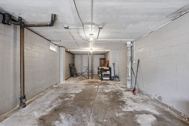2539 Vernon Ct SE, Cedar Rapids, IA 52403 - basement featuring concrete block wall and a garage