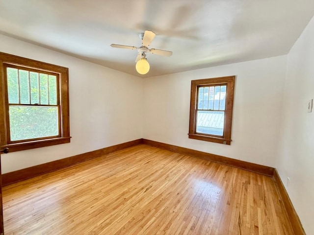 423 S 7th Ave, Iowa City, IA 52245 - spare room with light wood-style floors and a ceiling fan