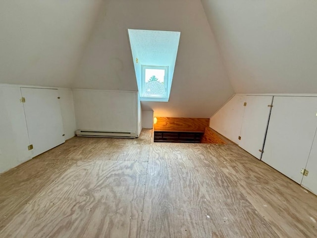 423 S 7th Ave, Iowa City, IA 52245 - bonus room featuring baseboard heating and lofted ceiling