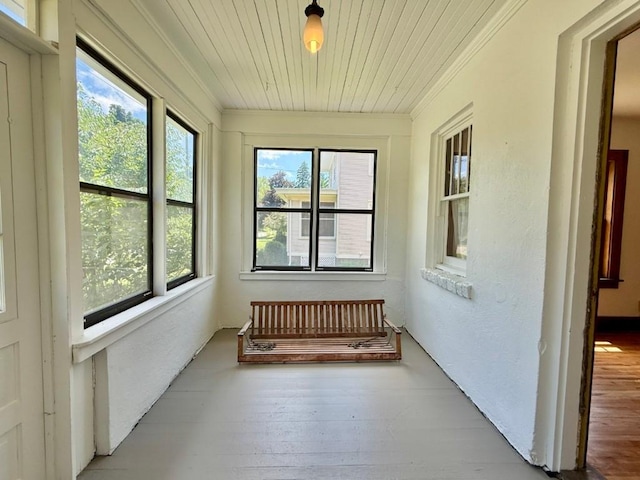 423 S 7th Ave, Iowa City, IA 52245 - unfurnished sunroom featuring ornamental molding, hardwood / wood-style floors, and wood ceiling