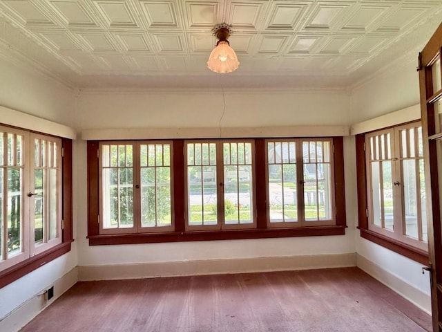 423 S 7th Ave, Iowa City, IA 52245 - unfurnished sunroom featuring french doors, ornamental molding, and an ornate ceiling