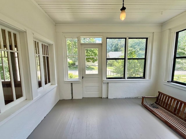 423 S 7th Ave, Iowa City, IA 52245 - unfurnished sunroom with wood-type flooring and wood ceiling