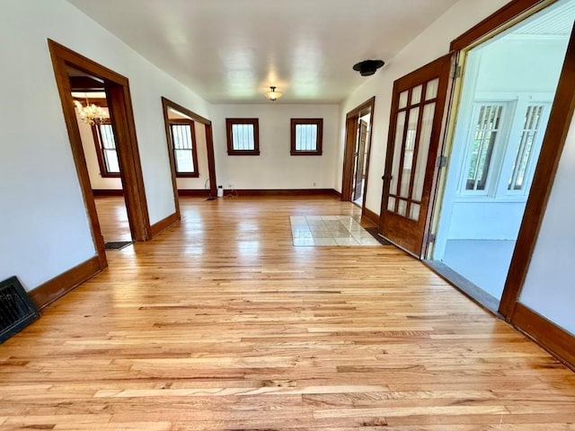 423 S 7th Ave, Iowa City, IA 52245 - entrance foyer featuring light wood-style flooring and french doors