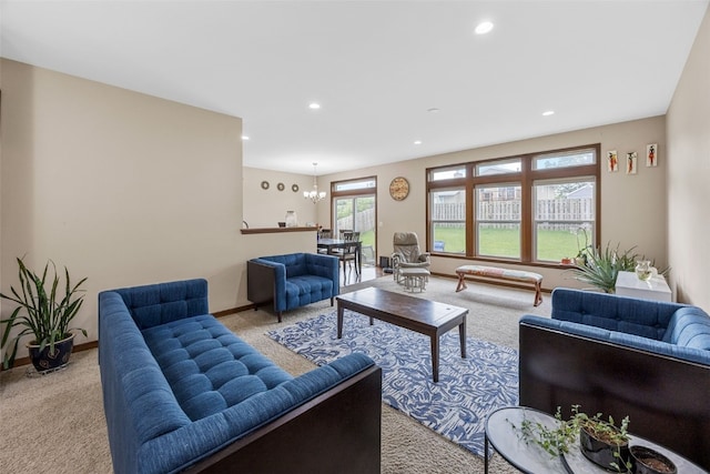 615 34th Ave, Marion, IA 52302 - carpeted living room with recessed lighting and a chandelier