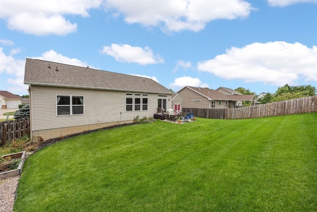615 34th Ave, Marion, IA 52302 - back of house with a fenced backyard and a patio area