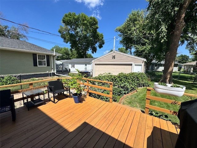 1175 28th St, Marion, IA 52302 - wooden terrace with an outbuilding and a garage