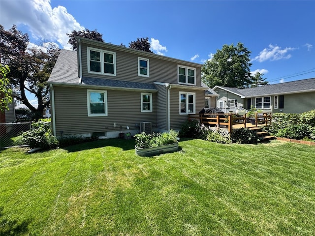 1175 28th St, Marion, IA 52302 - back of house featuring a wooden deck and roof with shingles