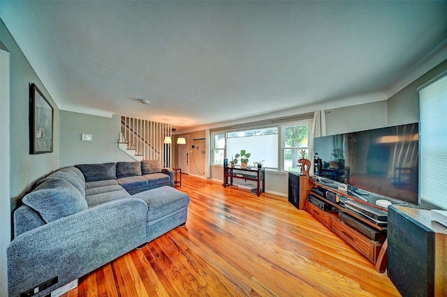 1175 28th St, Marion, IA 52302 - living area with light wood-type flooring and stairs