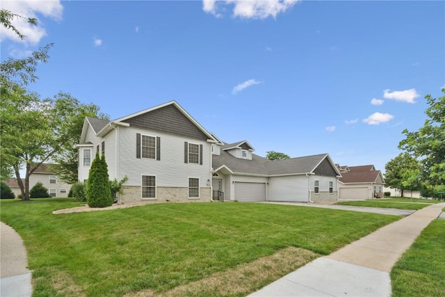 4555 Westchester Dr NE Unit B, Cedar Rapids, IA 52402 - view of front of home with concrete driveway, a front yard, and an attached garage
