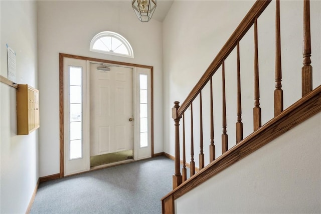 4555 Westchester Dr NE Unit B, Cedar Rapids, IA 52402 - foyer with stairs and carpet