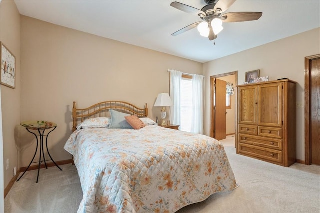 4555 Westchester Dr NE Unit B, Cedar Rapids, IA 52402 - bedroom with light colored carpet and a ceiling fan