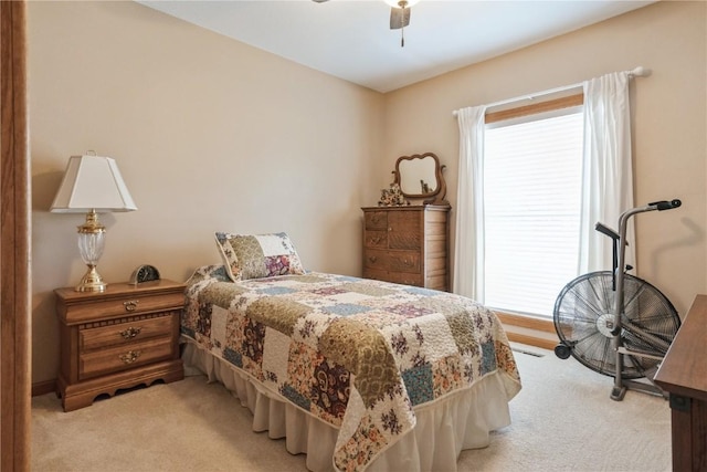 4555 Westchester Dr NE Unit B, Cedar Rapids, IA 52402 - bedroom featuring light colored carpet and ceiling fan