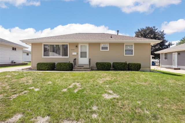360 29th St NW, Cedar Rapids, IA 52405 - view of front of property with a front lawn and entry steps