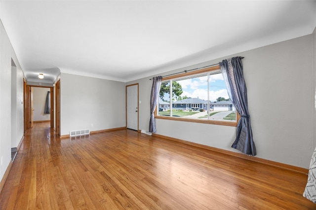 360 29th St NW, Cedar Rapids, IA 52405 - spare room featuring light wood-style flooring and baseboards