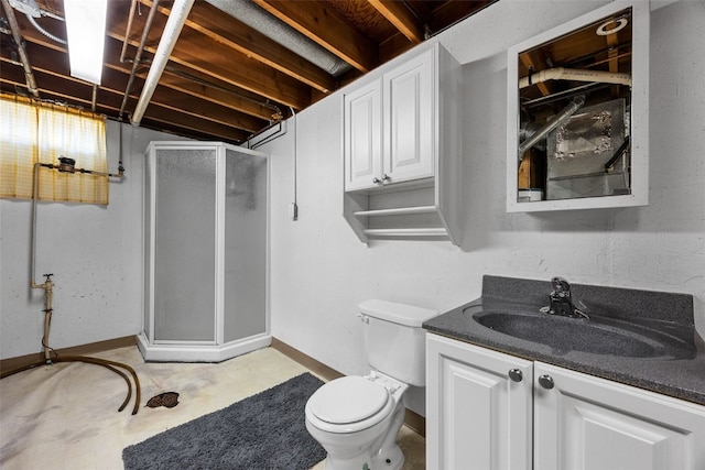 360 29th St NW, Cedar Rapids, IA 52405 - full bathroom with a stall shower, vanity, and concrete floors