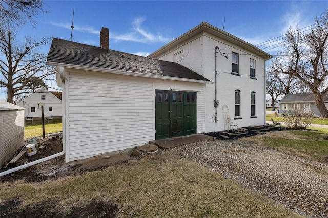 1860 E Ave NW, Cedar Rapids, IA 52405 - back of house with a chimney