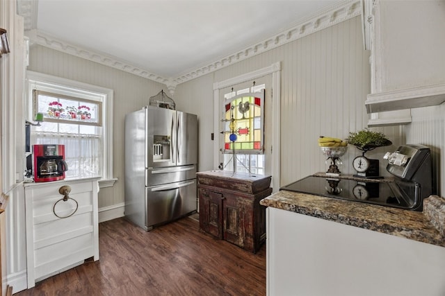 1860 E Ave NW, Cedar Rapids, IA 52405 - kitchen featuring stainless steel fridge with ice dispenser, dark wood-style floors, stove, and dark countertops