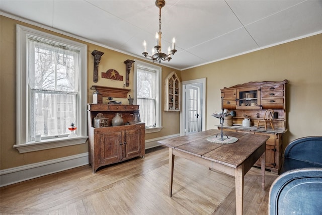 1860 E Ave NW, Cedar Rapids, IA 52405 - office area featuring a chandelier, light wood-type flooring, and crown molding