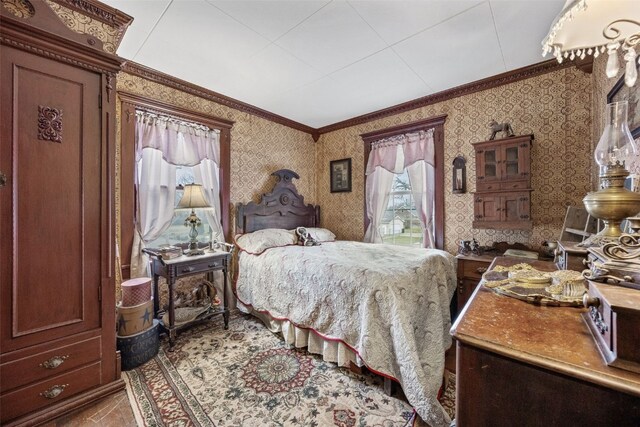 1860 E Ave NW, Cedar Rapids, IA 52405 - bedroom with wallpapered walls and ornamental molding