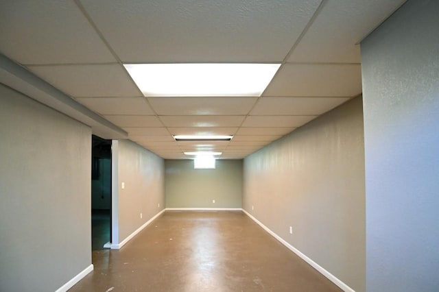 1135 Maplecrest Dr, Marion, IA 52302 - spare room featuring concrete flooring and a paneled ceiling