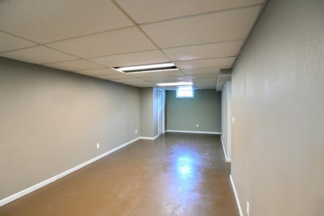 1135 Maplecrest Dr, Marion, IA 52302 - basement featuring baseboards and a drop ceiling